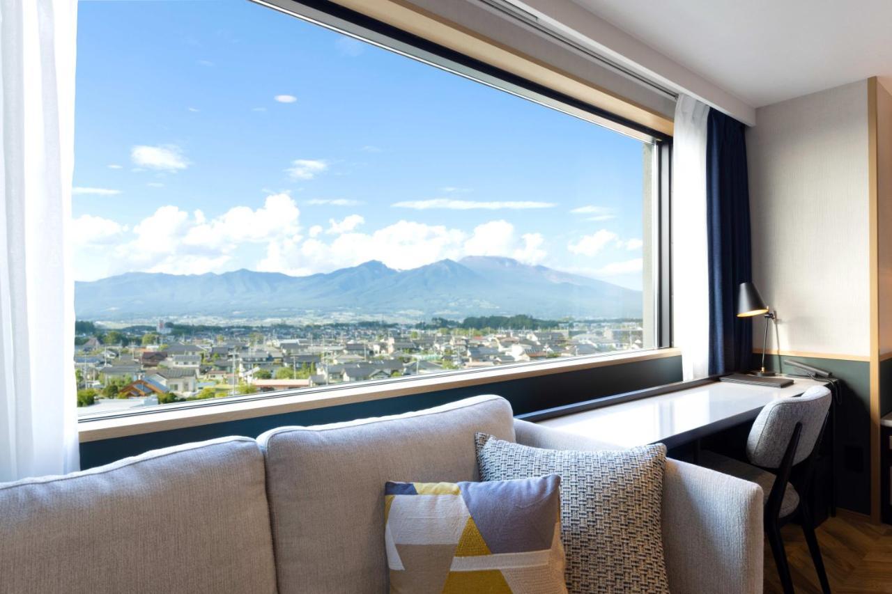 Aqa Hotel Premium Saku Bagian luar foto