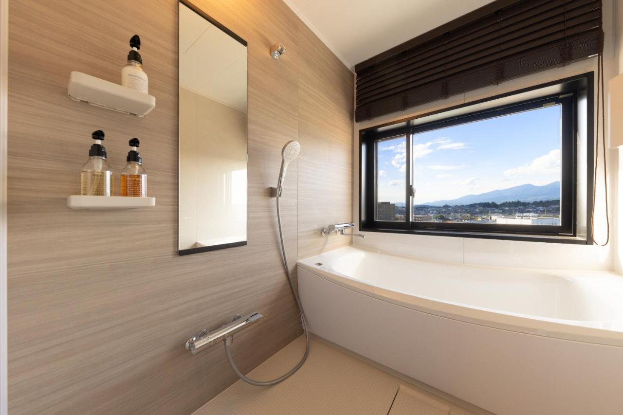 Aqa Hotel Premium Saku Bagian luar foto